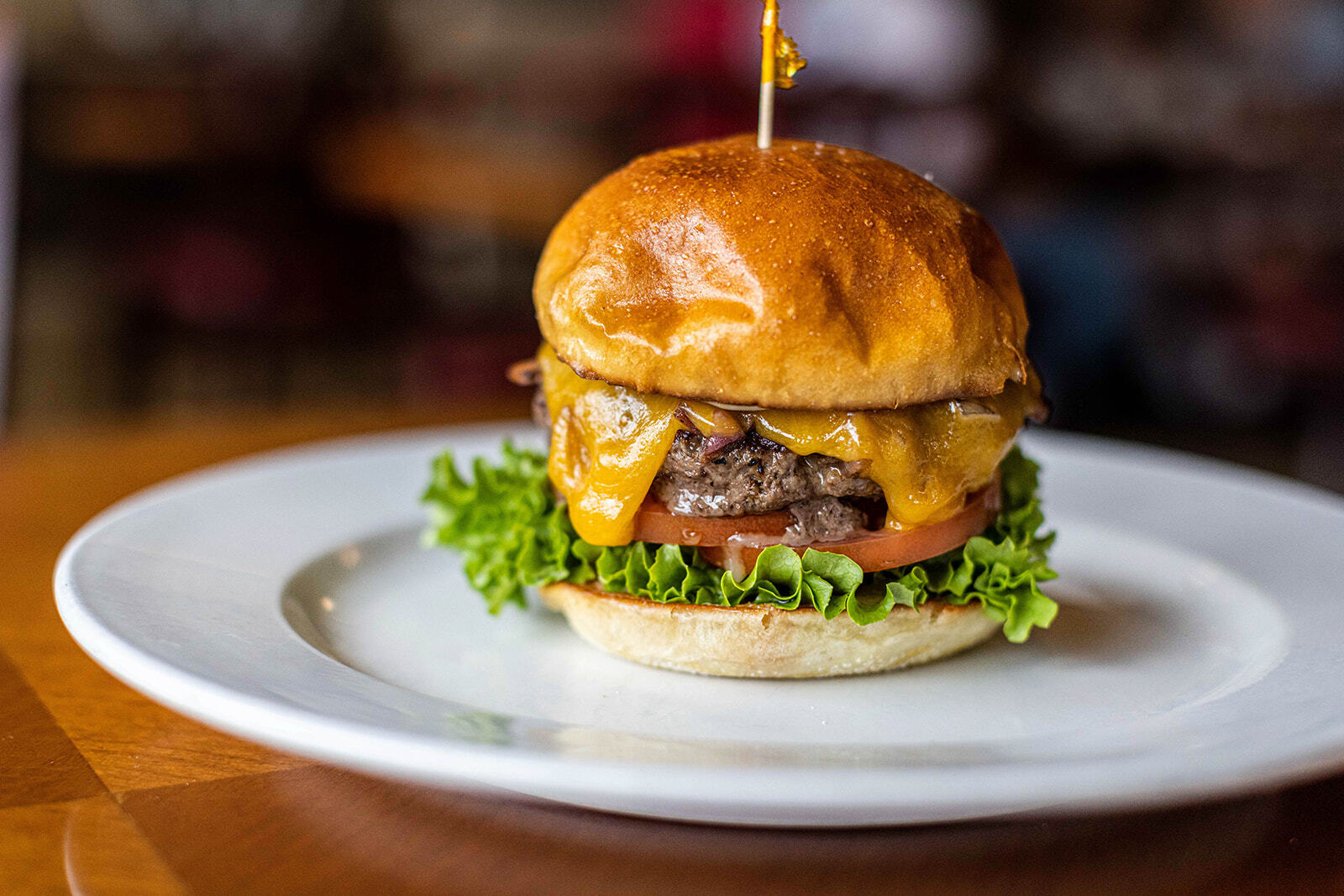 Cheeseburger plated at a restaurant